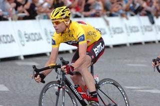 Cadel Evans (BMC) rides on the Champs-Elysees as Tour champion.
