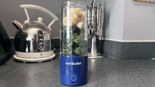 Banana, blueberries and kale in the Nutribullet Magic Bullet portable blender