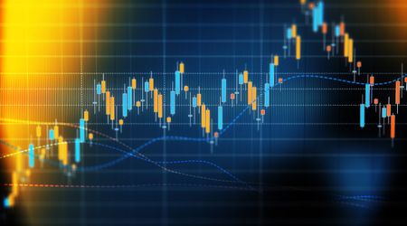 closeup of stock chart with teal and orange bard and dashed blue moving average