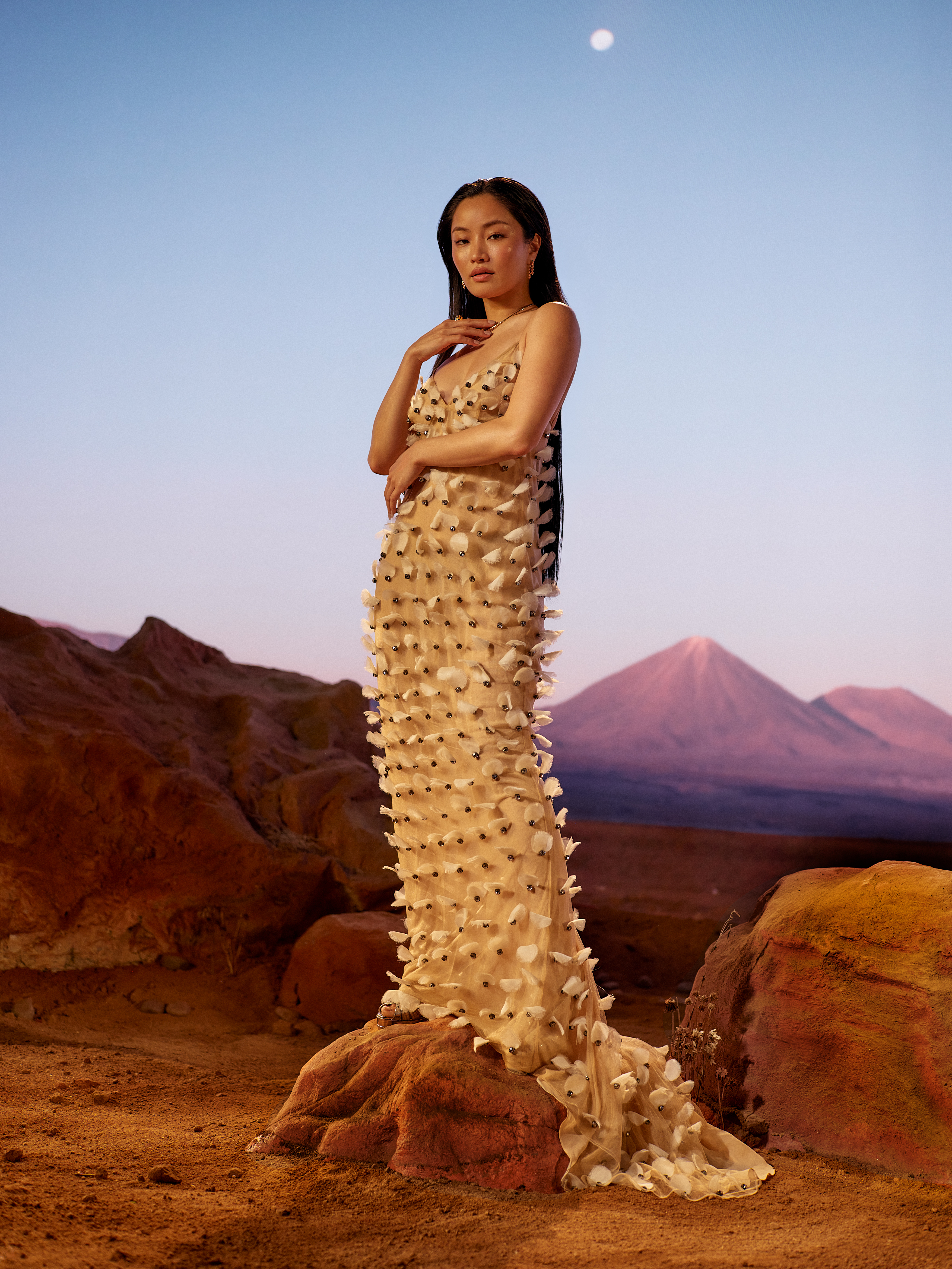Anna Sawai poses in a sculptural gown for Marie Claire's latest cover story