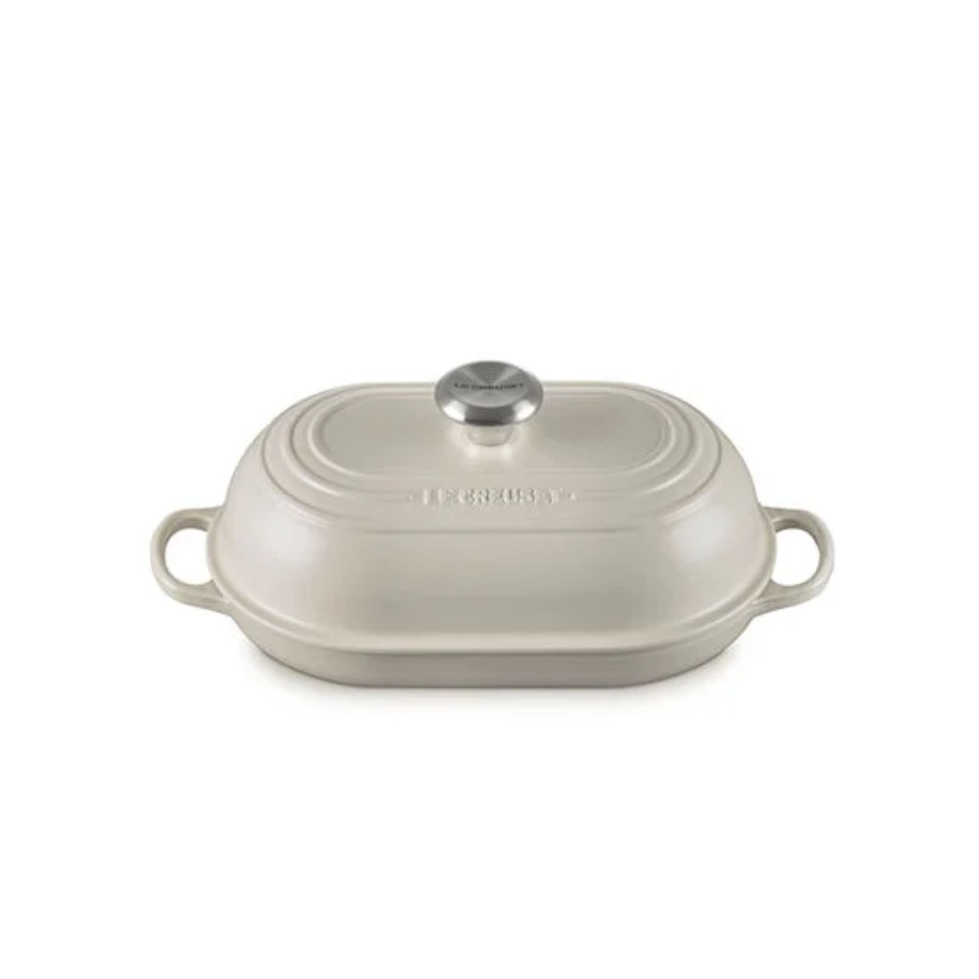 A cream cast iron bread oven with domed oval lid