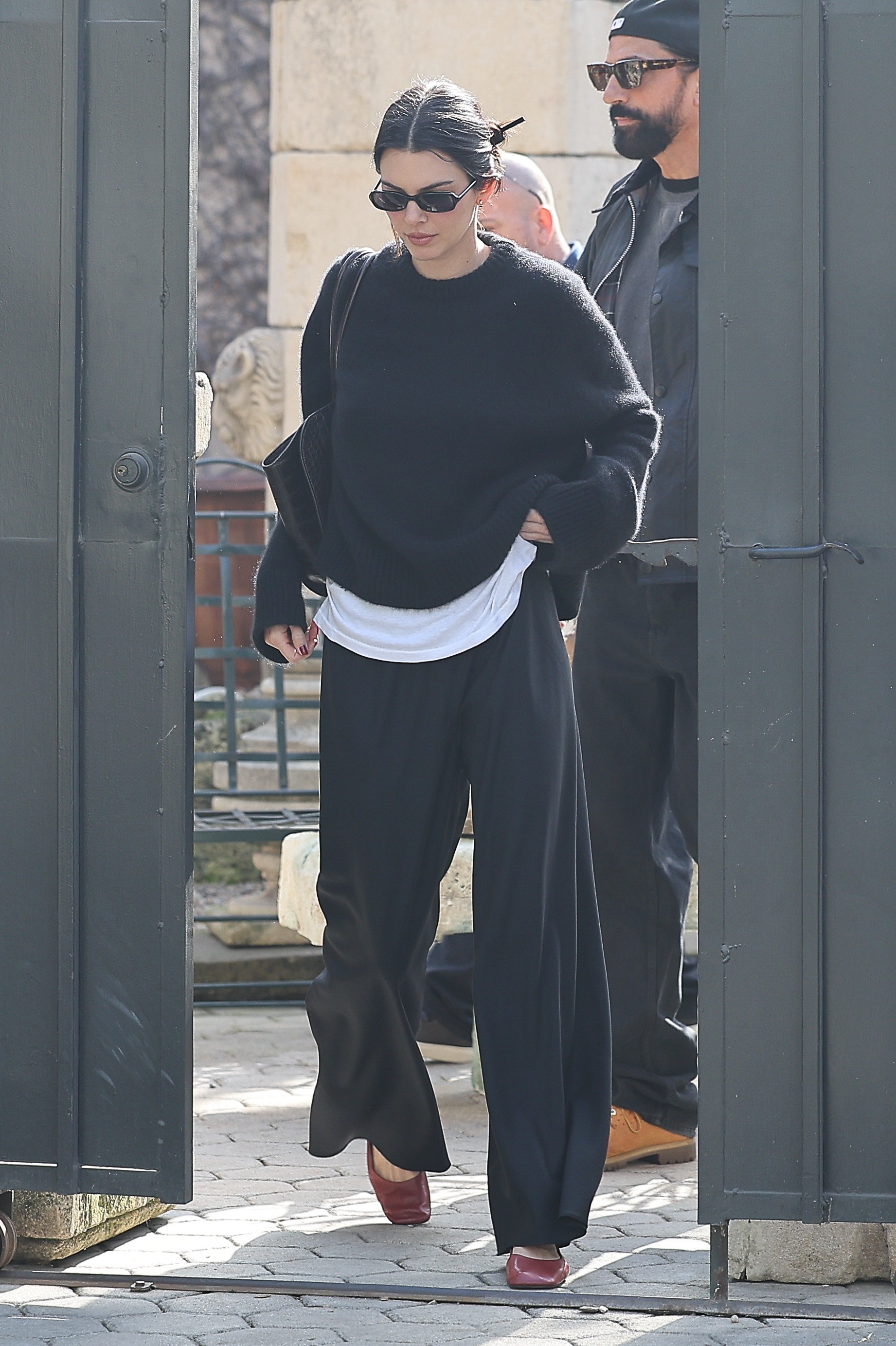 Kendall Jenner styled the Ophelia Sweater from The Row in black in Dec. 2025