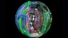 Taken with a fish-eye lens, this image shows the Compact Muon Solenoid (CMS) detector assembly in a tunnel of the Large Hadron Collider (LHC).