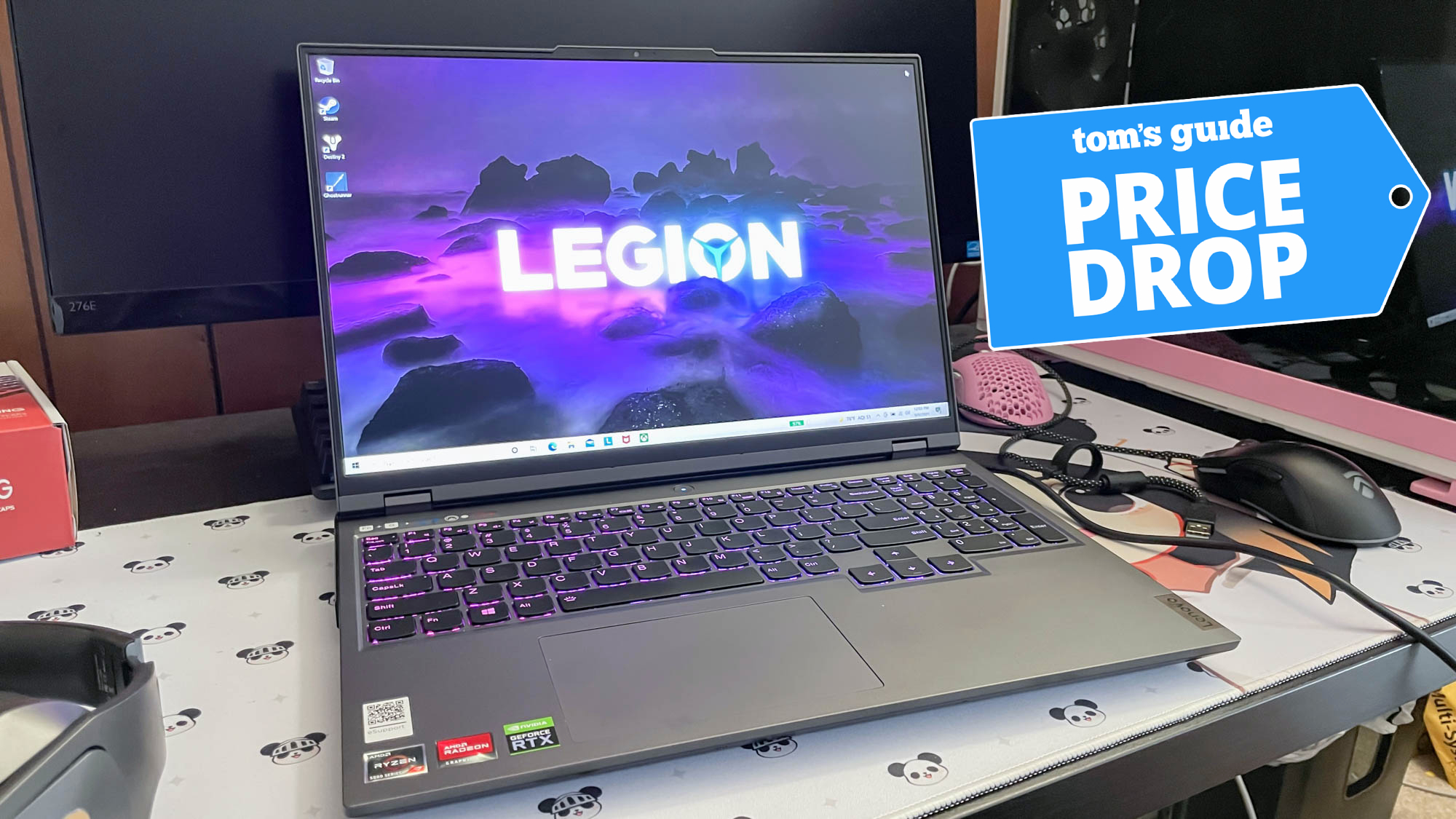 Lenovo Legion 5 Pro on desk with black friday tag superimposed