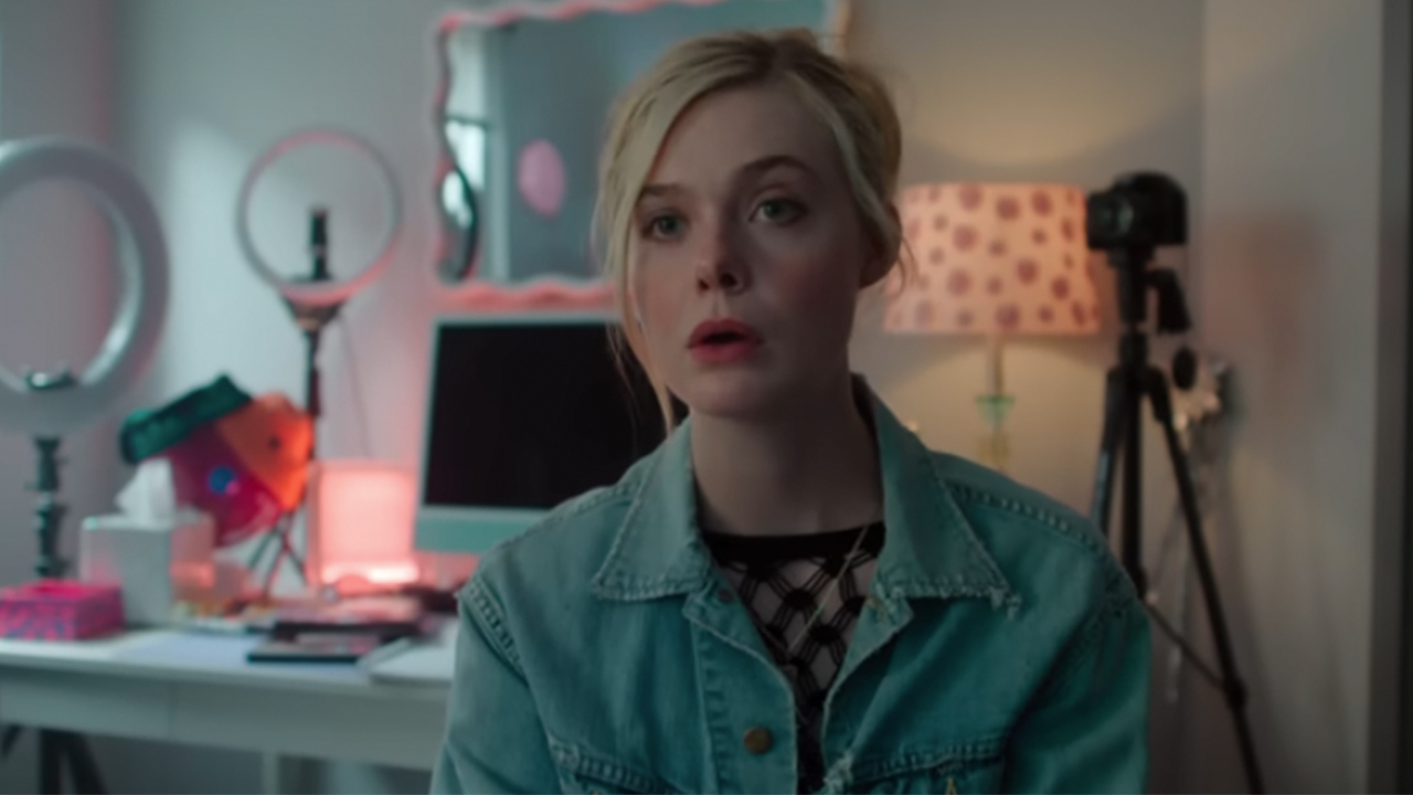 Elle Fanning looking surprised in Margo's Got Money Troubles
