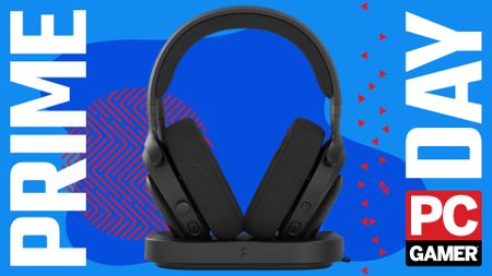 A Fractal Design Scape gaming headset on top of its magnetic charging stand, on a blue and red Amazon Prime Day deals background