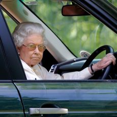 Queen Elizabeth II seen driving her Range Rover car as she watches the International Carriage Driving Grand Prix event on day 4 of the Royal Windsor Horse Show at Home Park on May 17, 2014 in Windsor, England. 