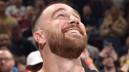 Travis Kelce smiles during the game between the Boston Celtics and the Cleveland Cavaliers on March 5, 2024.
