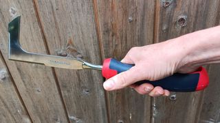 Author holding Spear & Jackson patio knife