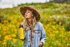 girl with sunflower hydro flask