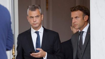 Alexis Kohler and Emmanuel Macron arrive to attend the weekly cabinet meeting at The Elysee Presidential Palace in Paris on 31 August