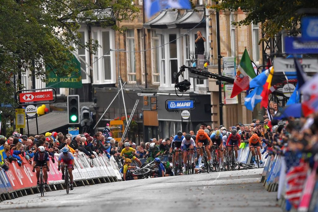 Jastrab and Aigul Gareeva (Russia) race ahead of the peloton