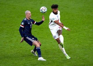 Tyrone Mings in action against Scotland