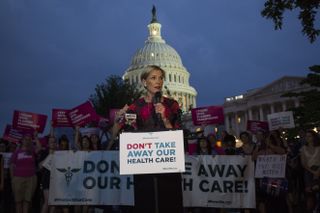 Cecile Richards stands at a podium outside the White House in 2017