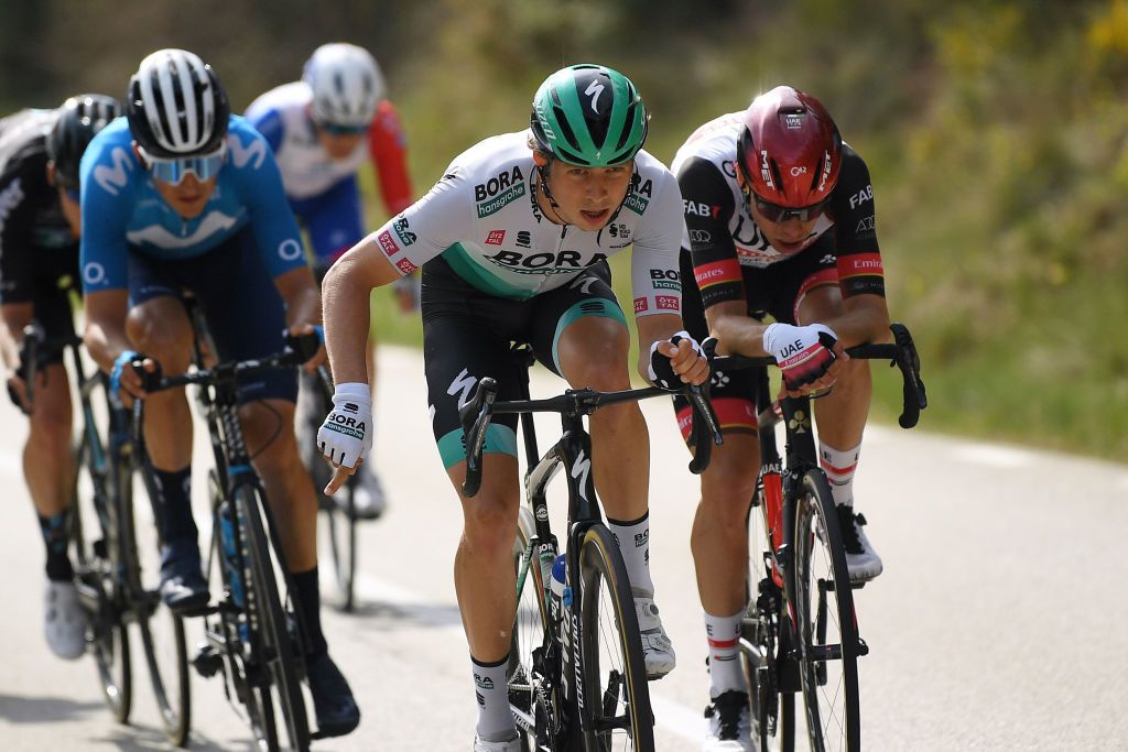 MANRESA SPAIN MARCH 26 Ide Schelling of Netherlands and Team BORA Hansgrohe David De La Cruz Melgarejo of Spain and UAE Team Emirates during the 100th Volta Ciclista a Catalunya 2021 Stage 5 a 2015km stage from La Pobla De Segur to Manresa 220m Breakaway VoltaCatalunya100 on March 26 2021 in Manresa Spain Photo by David RamosGetty Images