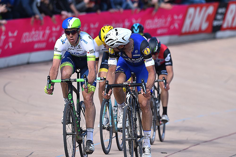 Tom Boonen (Etixx-QuickStep) looks back at Matt Hayman )Orica-GreenEdge) in the velodrome at Paris-Roubaix