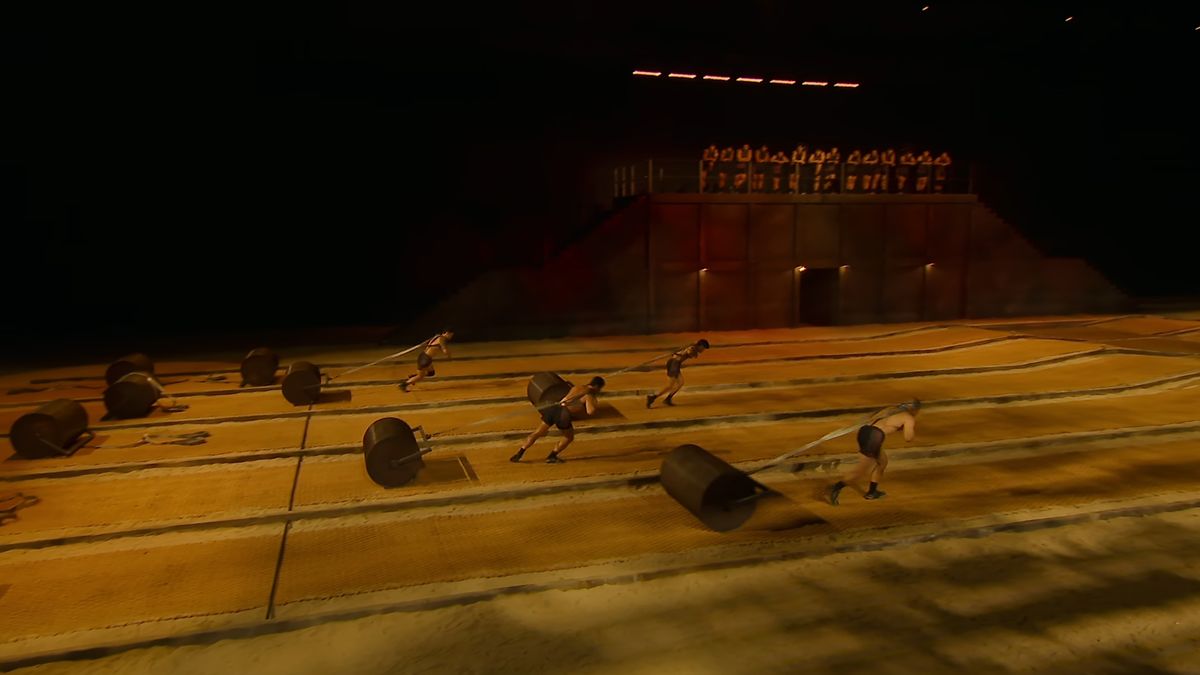 Contestants pulling rollers mid-quest in Physical: 100 season 2 episode 8