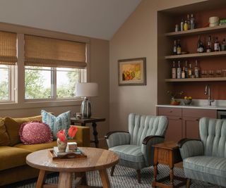 cozy living room with a home bar and a mix of modern and vintage furnishings