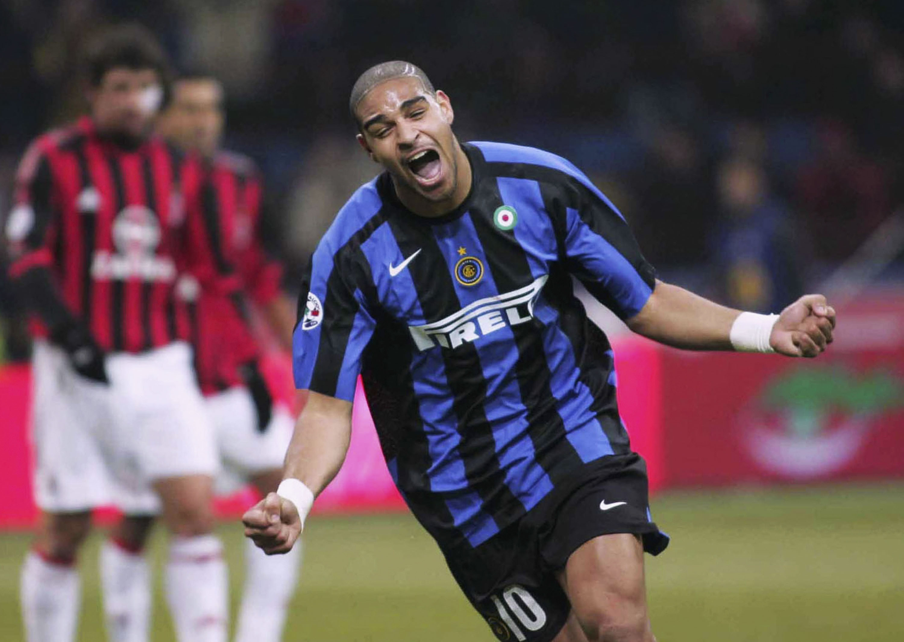 Adriano celebrates a goal for Inter against AC Milan in December 2005.