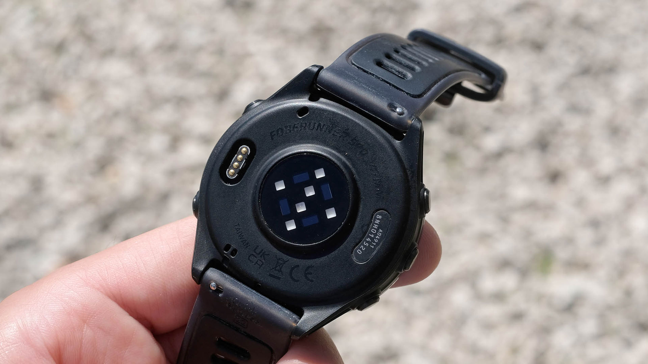 A close-up picture of the PPG sensor in the Garmin Forerunner 570