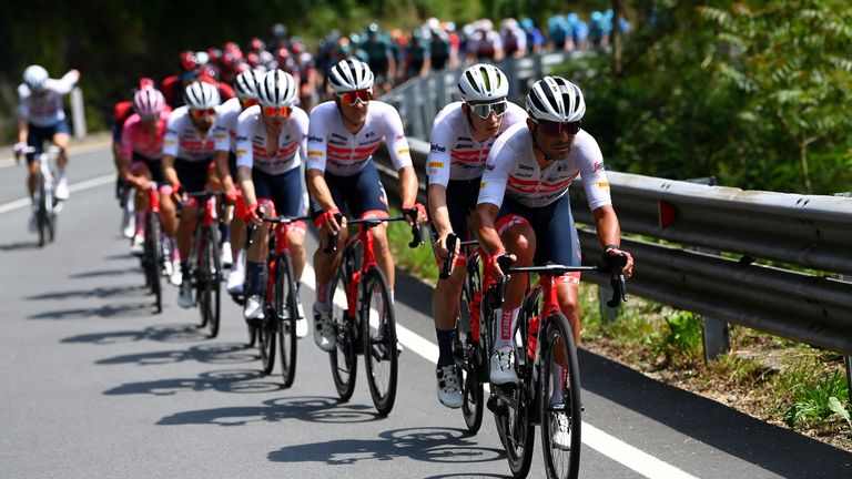 Trek-Segafredo head the peloton during stage 12 of the 2022 Giro