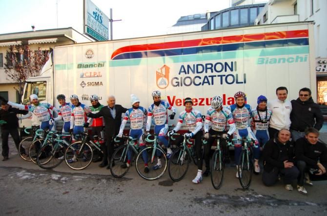 Androni Giocattoli line up in front of the team truck
