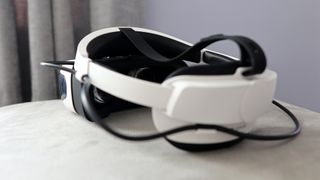 DPVR E4 virtual reality headset with controllers from various angles.