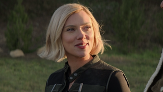 Black Widow smiling at the end of her movie