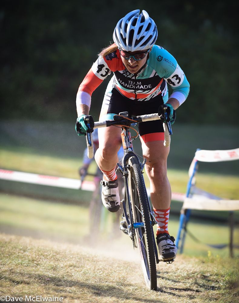 Megan Korol (Team Handmade) rides a new off-camber section of the course on her last lap