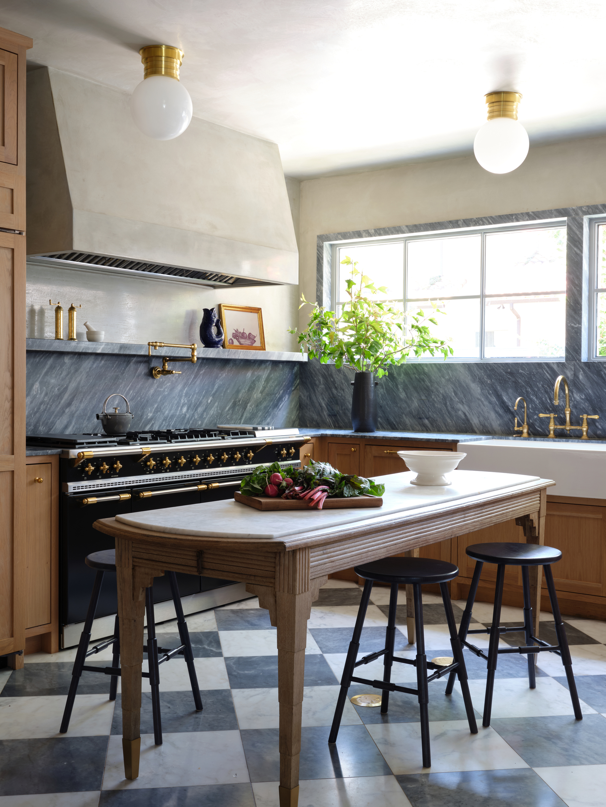 kitchen with checker print floor and a freestanding island