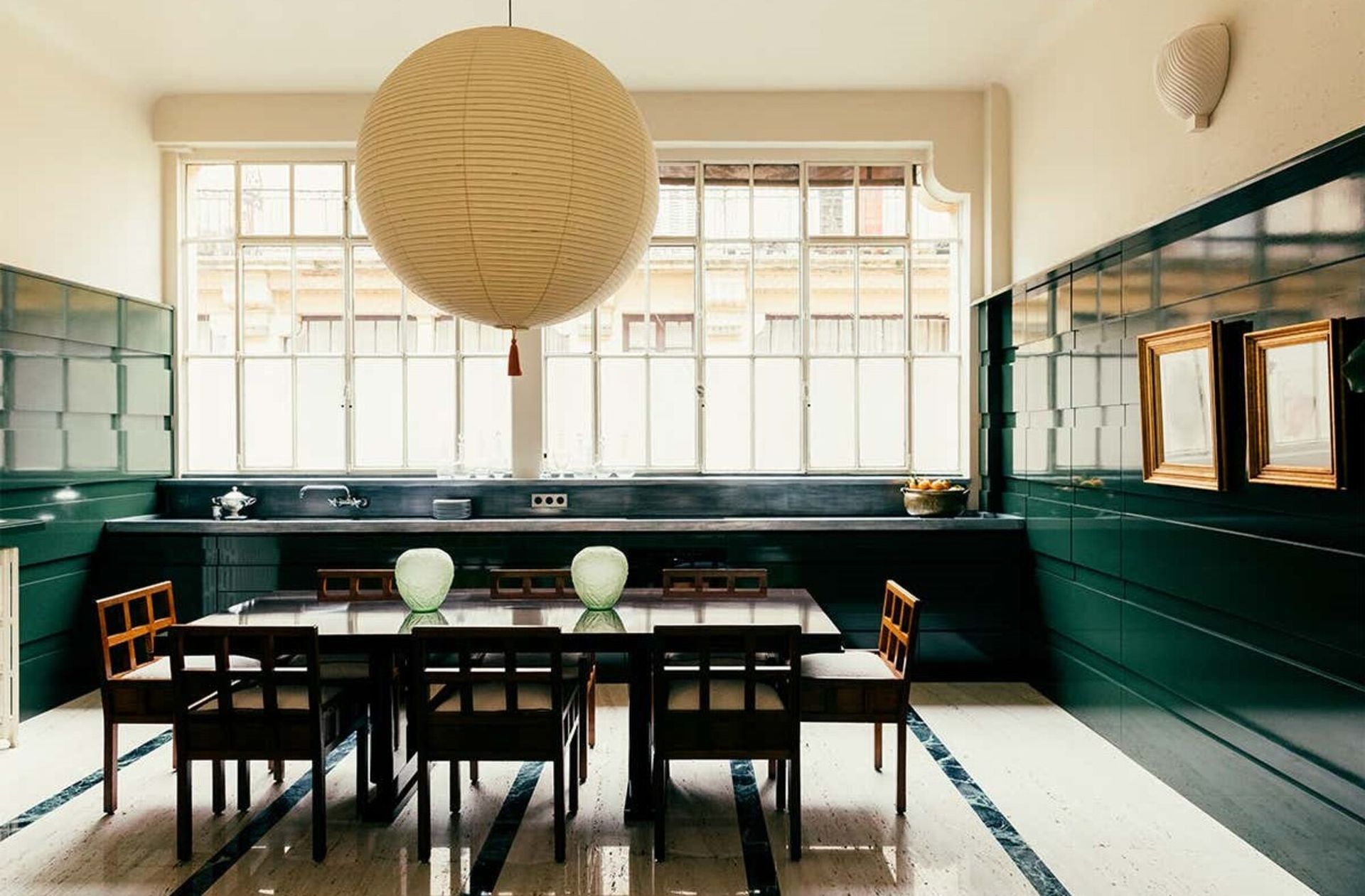 A high-gloss green kitchen cabinet