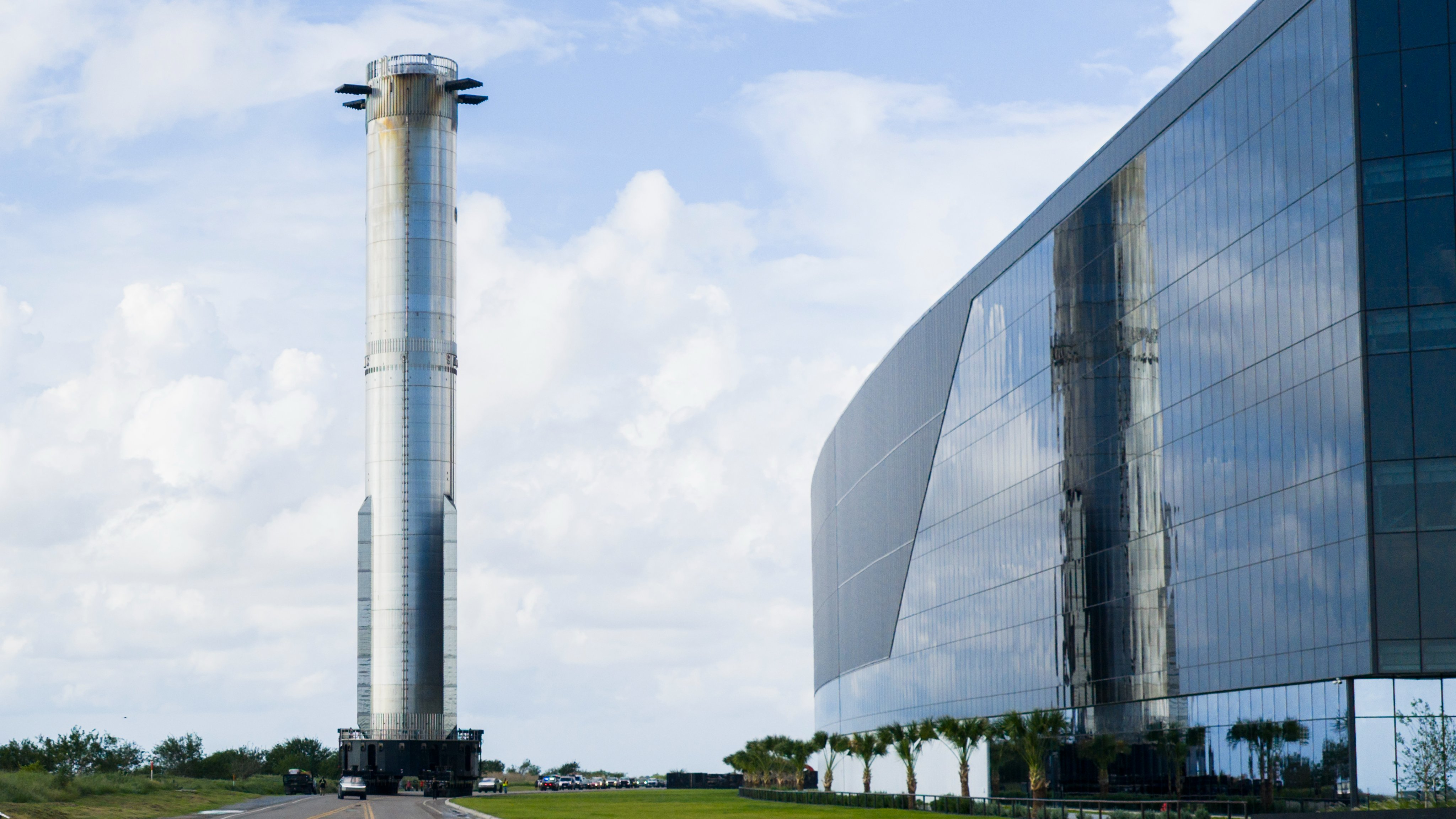 SpaceX rolls the Starship Flight 11 Super Heavy booster to the launch site. SpaceX posted this photo on X on Oct. 8, 2025.