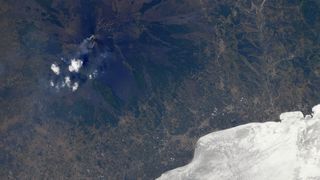 Europe's most active volcano Mount Etna seen spewing lava from aboard the International Space Station.