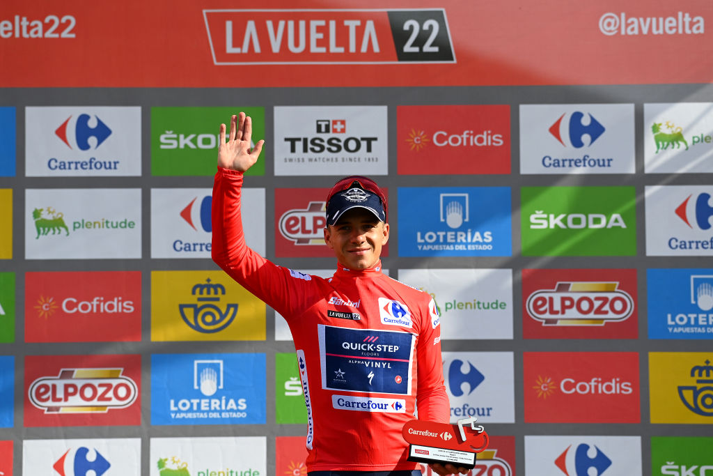 COLLU FANCUAYA SPAIN AUGUST 27 Remco Evenepoel of Belgium and Team QuickStep Alpha Vinyl Red Leader Jersey celebrates at podium during the 77th Tour of Spain 2022 Stage 8 a 1534km stage from Pola de Laviana to Collu Fancuaya 1084m LaVuelta22 WorldTour on August 27 2022 in Collu Fancuaya Spain Photo by Tim de WaeleGetty Images