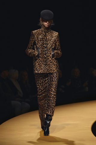 A runway model wearing a F/W 2025 Khaite outfit.