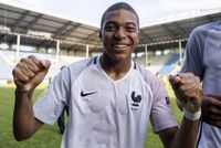 Kylian Mbappe of France celebrates the victory during the U19 match between Portugal and France at Carl-Benz-Stadium on July 21, 2016 in Mannheim, Germany.