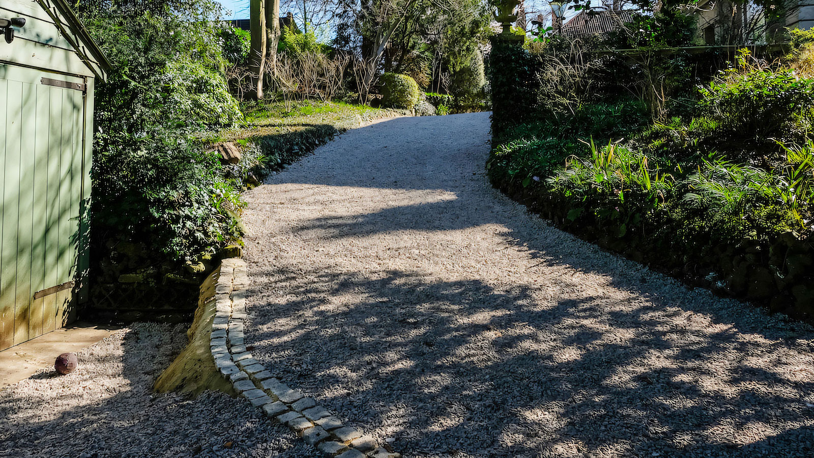 sloping gravelled driveway