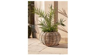 The best outdoor plant pots: Cox & Cox Round Rattan Ball Planter