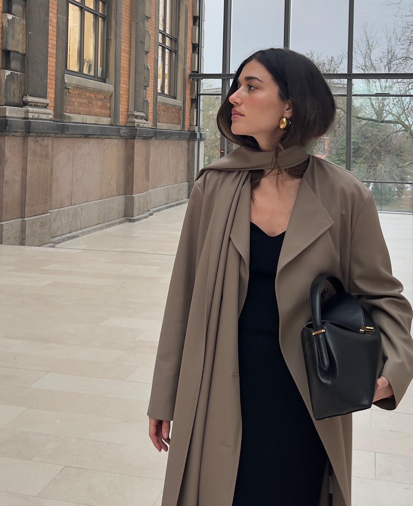Lida Ilirida Krasniqi 31 Affordable Quiet Luxury Finds for Expensive-Looking Outfits Built In Scarf Trench Coat Gold Earrings Toteme Bag