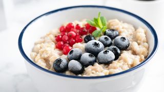 Bowl of porridge topped with berries