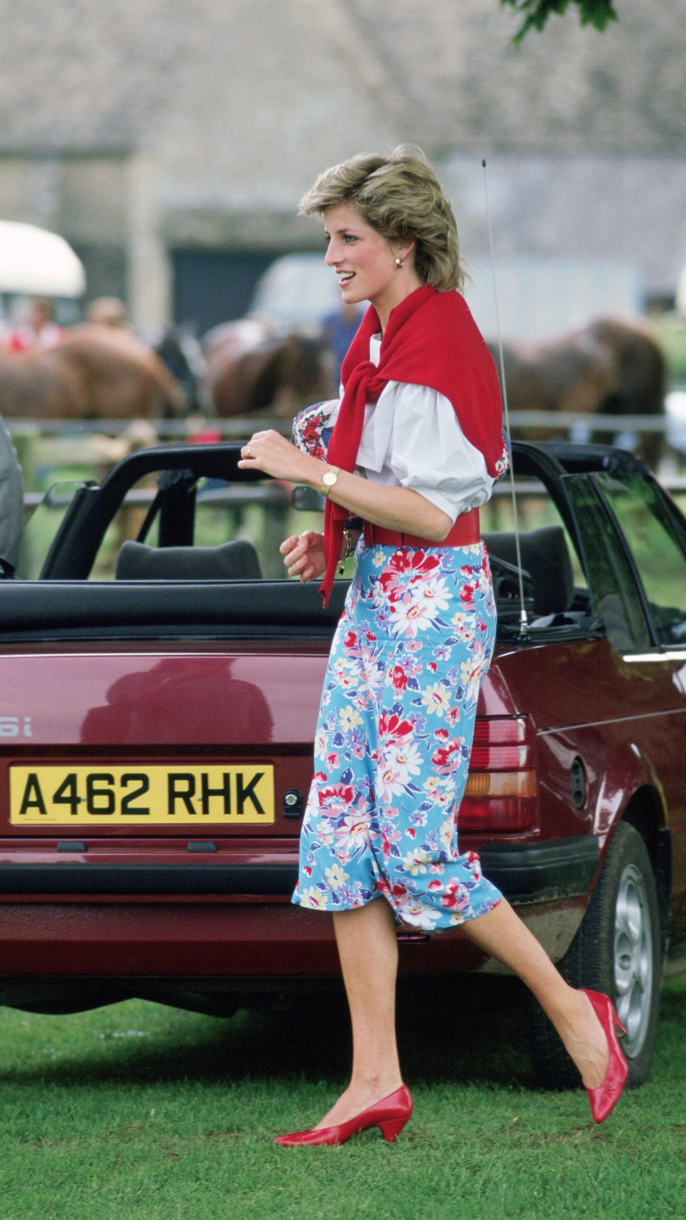 Princess Diana At Cirencester Polo Club With Her Maroon Red Ford Escort Cabriolet Car (Photo by Tim Graham Photo Library via Getty Images)