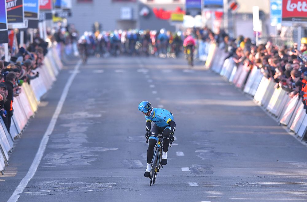 Michael Valgren (Astana) looks back as he is about to win Omloop Het Nieuwsblad Elite