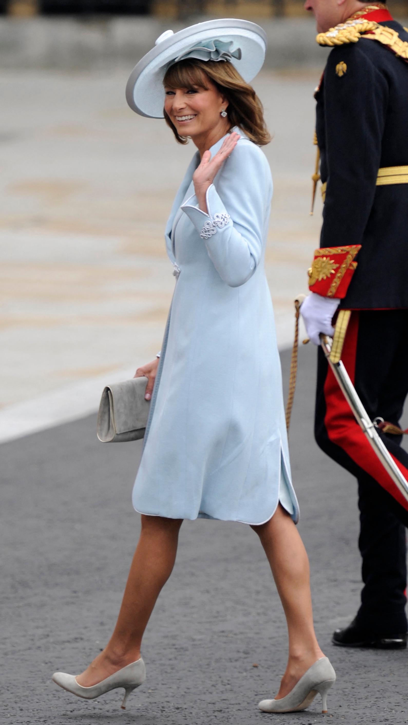 Carole Middleton waves as she arrives at the West Door of Westminster Abbey for the wedding of Prince William and Kate in London on April 29, 2011