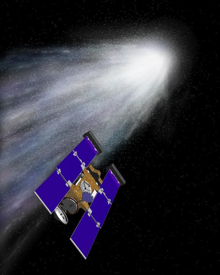 An artist&#039;s concept of the Stardust spacecraft beginning its flight through gas and dust around comet Wild 2. 