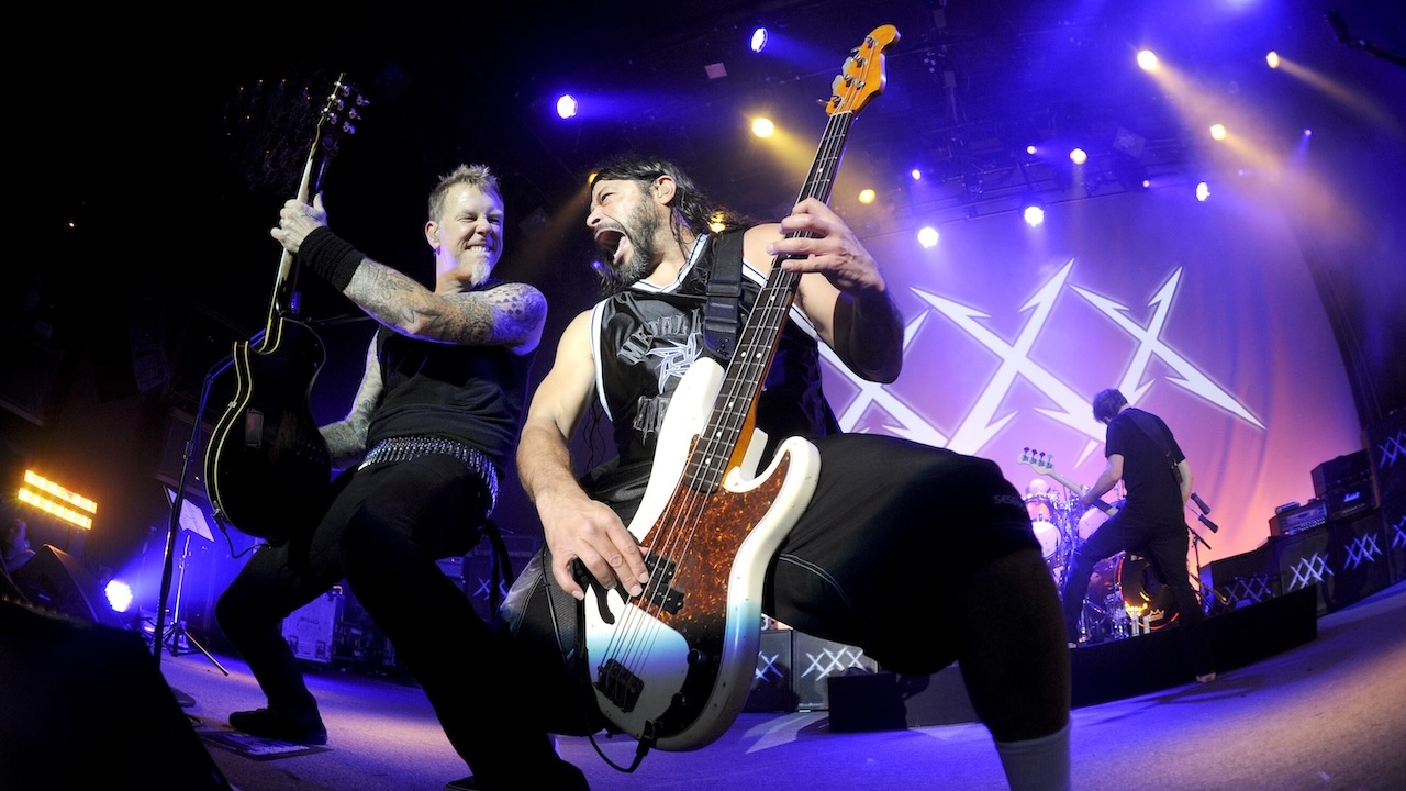 James Hetfield, Robert Trujillo, and Jason Newsted of Metallica perform at Day Four of the bands' 30th Anniversary shows at The Fillmore on December 10, 2011 in San Francisco, California.