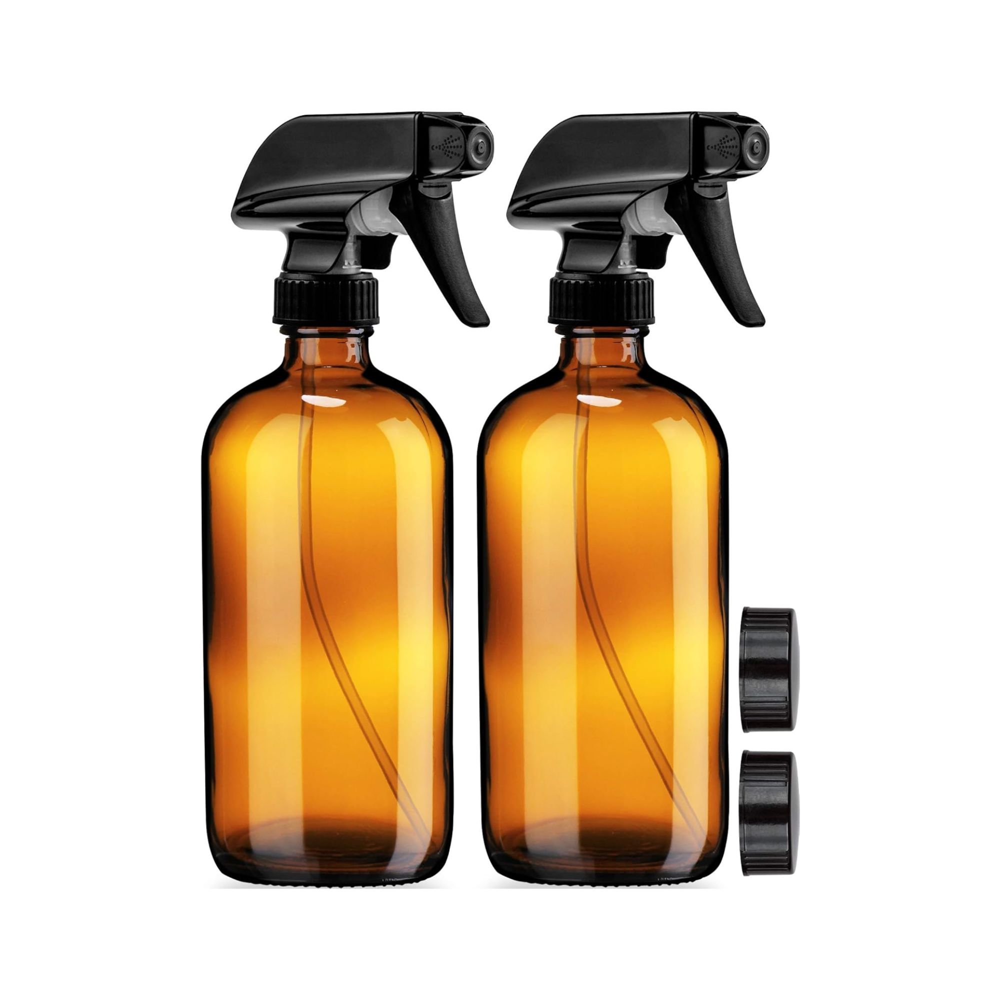 Two amber glass spray bottles with black lids