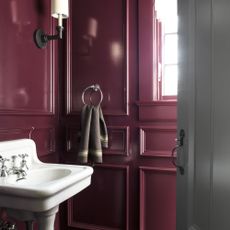 cloakroom design mistakes, small plum bathroom with panelling, white basin 