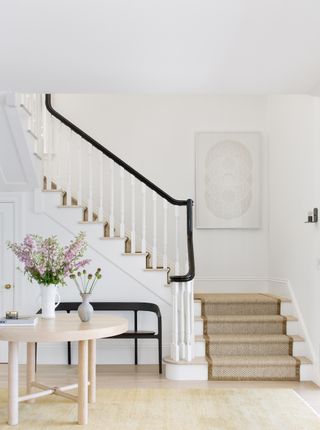 Neutral hallway with natural jute runner