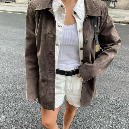 woman wearing suede button down jacket trend 2026