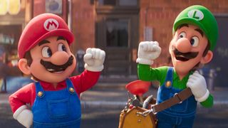 Mario and Luigi smile and bump fists in The Super Mario Bros. Movie